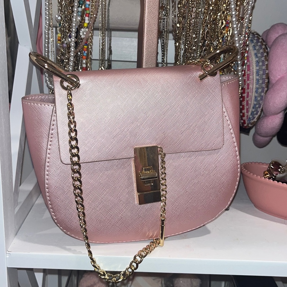 Pink structured cross body bag